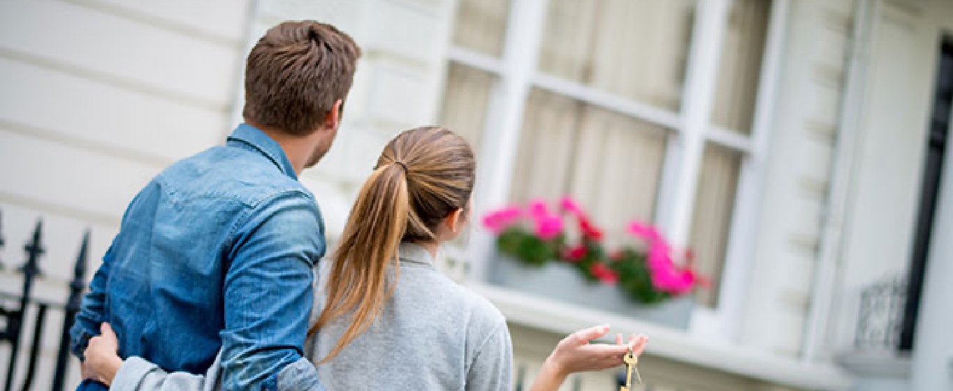 a couple buying a new home