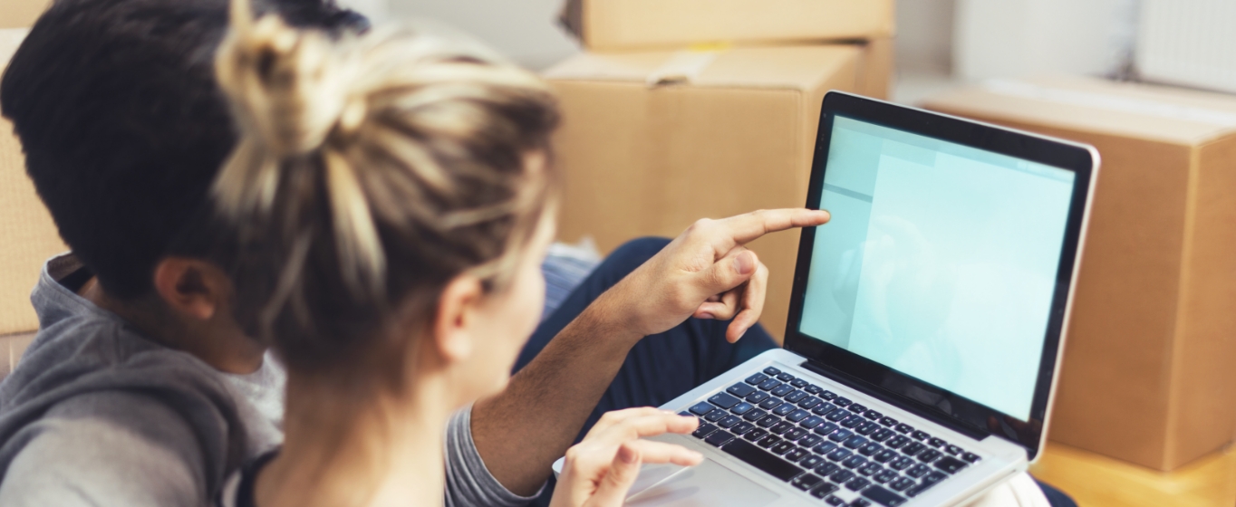 a young couple managing their finances online